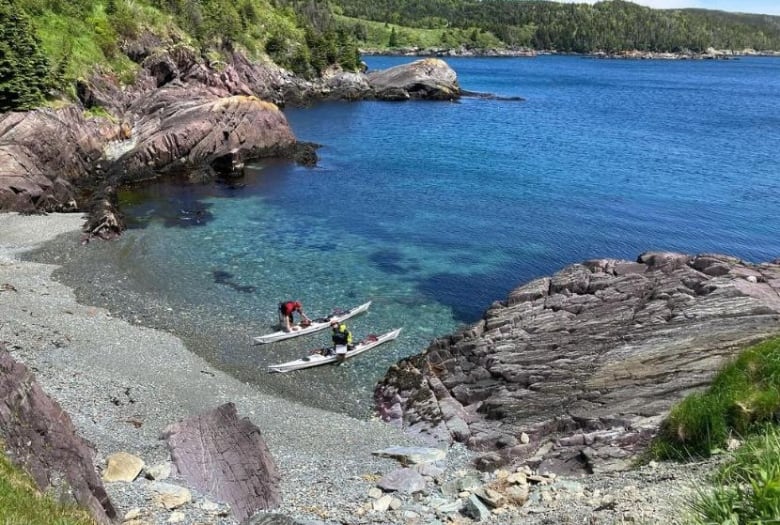 Chasing a record, at the whims of the sea, 2 kayakers paddle around Newfoundland in 49 days | CBC News