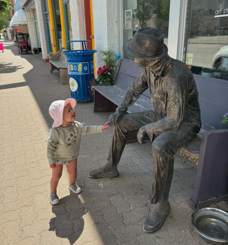 Shop owner getting headache over constant decapitation of statue | CBC News