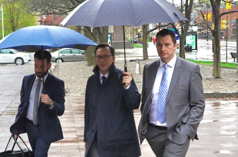 Former firefighter, captain found not guilty for roles in dish dispute that got physical | CBC News