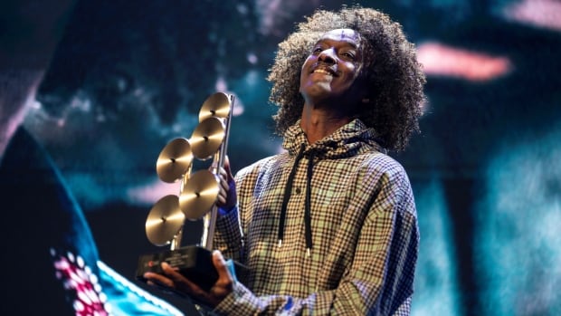 K'naan, rapper behind Wavin' Flag megahit, charged with sexual assault in Quebec City | CBC News