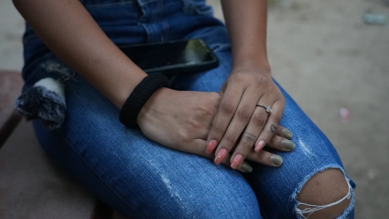 A new bride at 18, she says he'd often force himself on her. It's not rape in India | CBC News