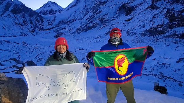Couple from northwestern Ontario wave their First Nations' flags at Mount Everest's base camp | CBC News