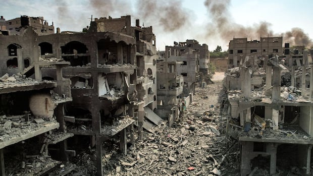Israel strikes targets in southern Beirut suburbs, port city of Tyre | CBC News