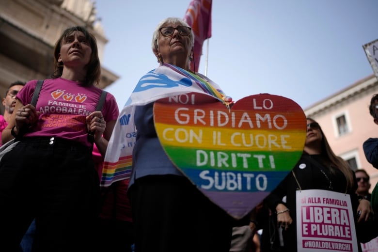 Italy passes law banning surrogacy abroad that activists say targets LGBTQ+ couples | CBC News