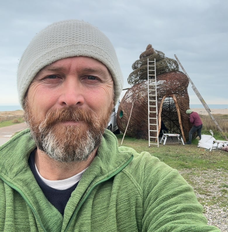 Artist says he didn't see his seashell sculpture's resemblance to the poop emoji until after its construction
