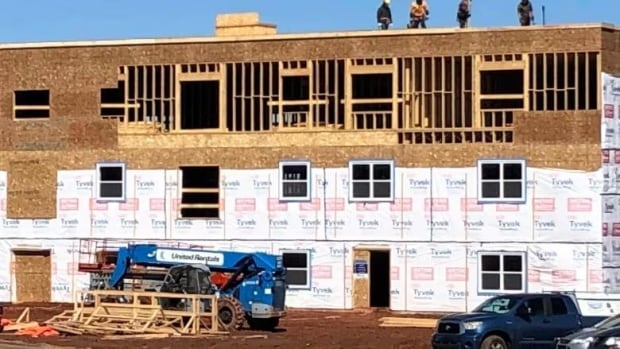 Liberal government's immigration plan will cut housing gap almost in half, report says