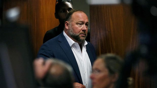 The Onion buys Alex Jones's conspiracy site Infowars at bankruptcy auction