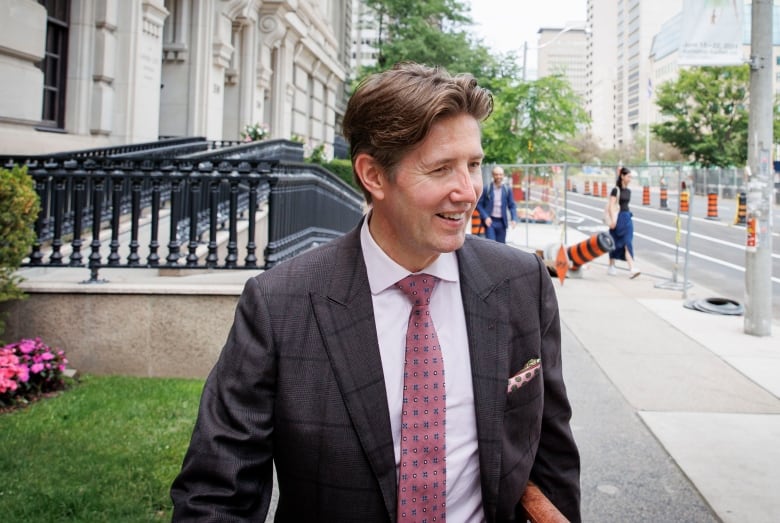 Toronto lawyer who stole client money for vacations, handbags and shoes is jailed for contempt
