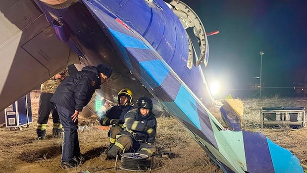 Azerbaijani official suggests airliner was hit by a weapon before crash that killed 38
