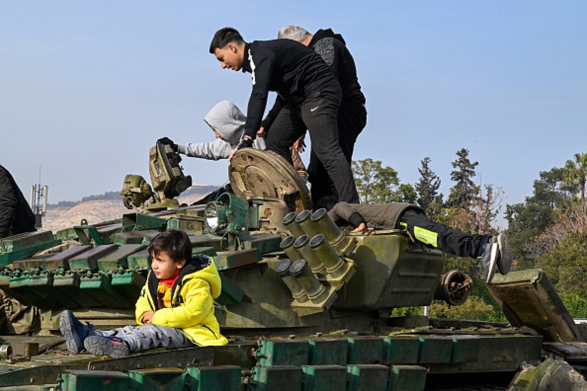 Little-known leader takes charge as Syria's interim prime minister, with support from rebels