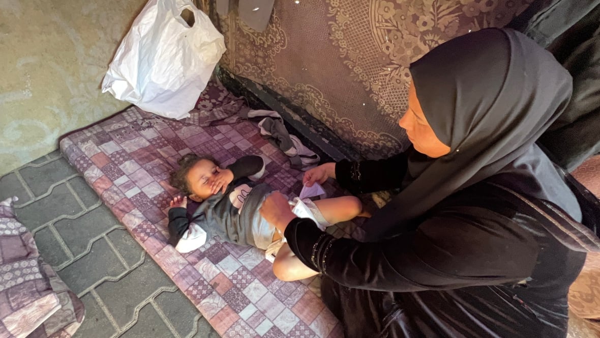 Some Gaza mothers forced to reuse diapers, sell jewelry to afford them