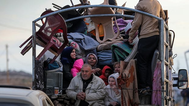 Hamas accuses Israel of violating ceasefire, says it will stop releasing hostages