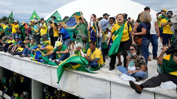 Brazil's Supreme Court votes to put Bolsonaro on trial for alleged coup attempt