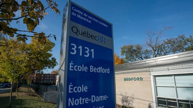 Quebec bill would extend religious symbols ban to school support workers, force students to uncover faces