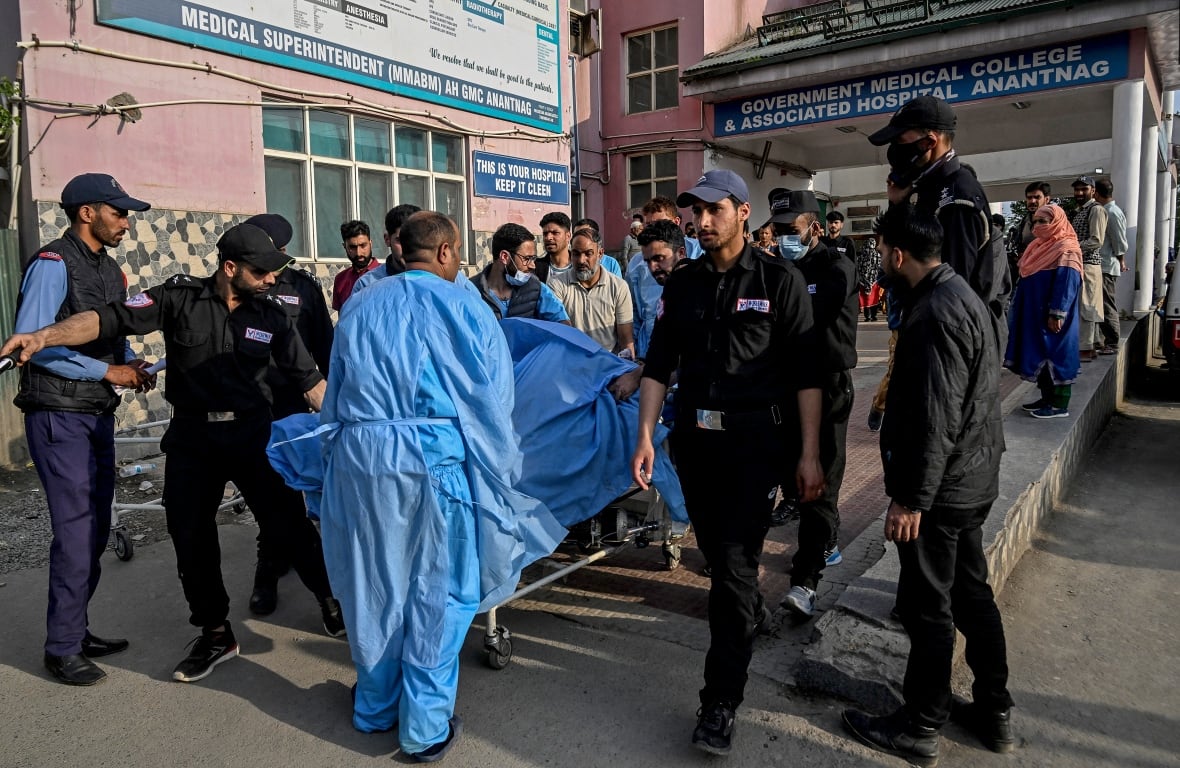 Gunmen kill at least 20 in Kashmiri tourist town
