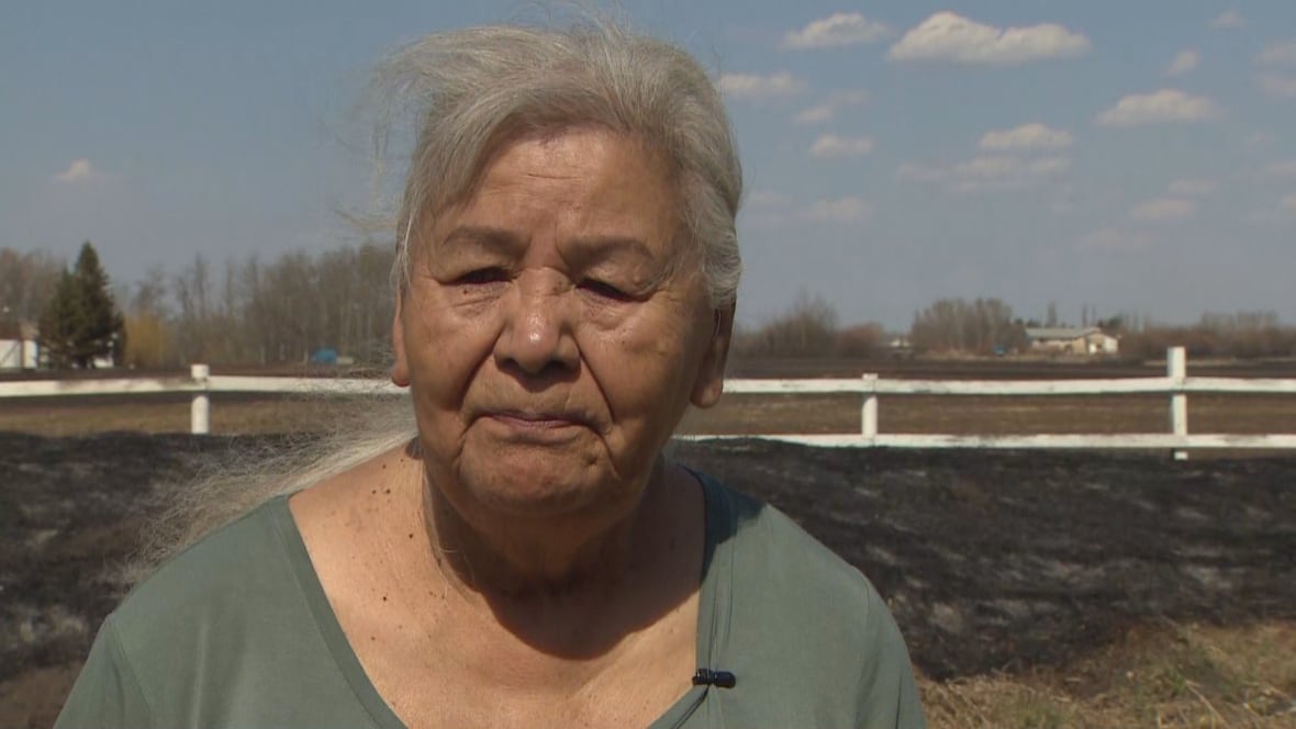 Homes destroyed by fast-moving flames as Alberta battles 23 fires