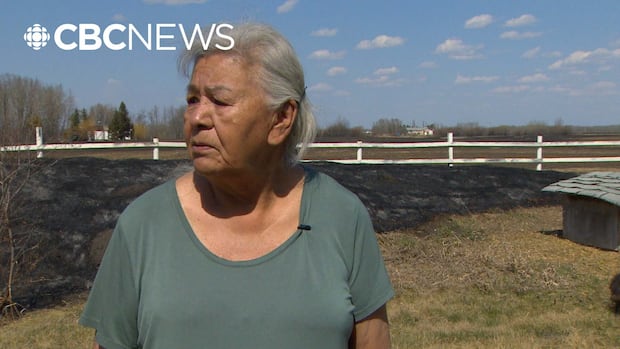Homes destroyed by fast-moving flames as Alberta battles 23 wildfires