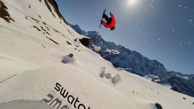 Norwegian snowboarder goes orbital to land historic quad flip in Swiss Alps stunner