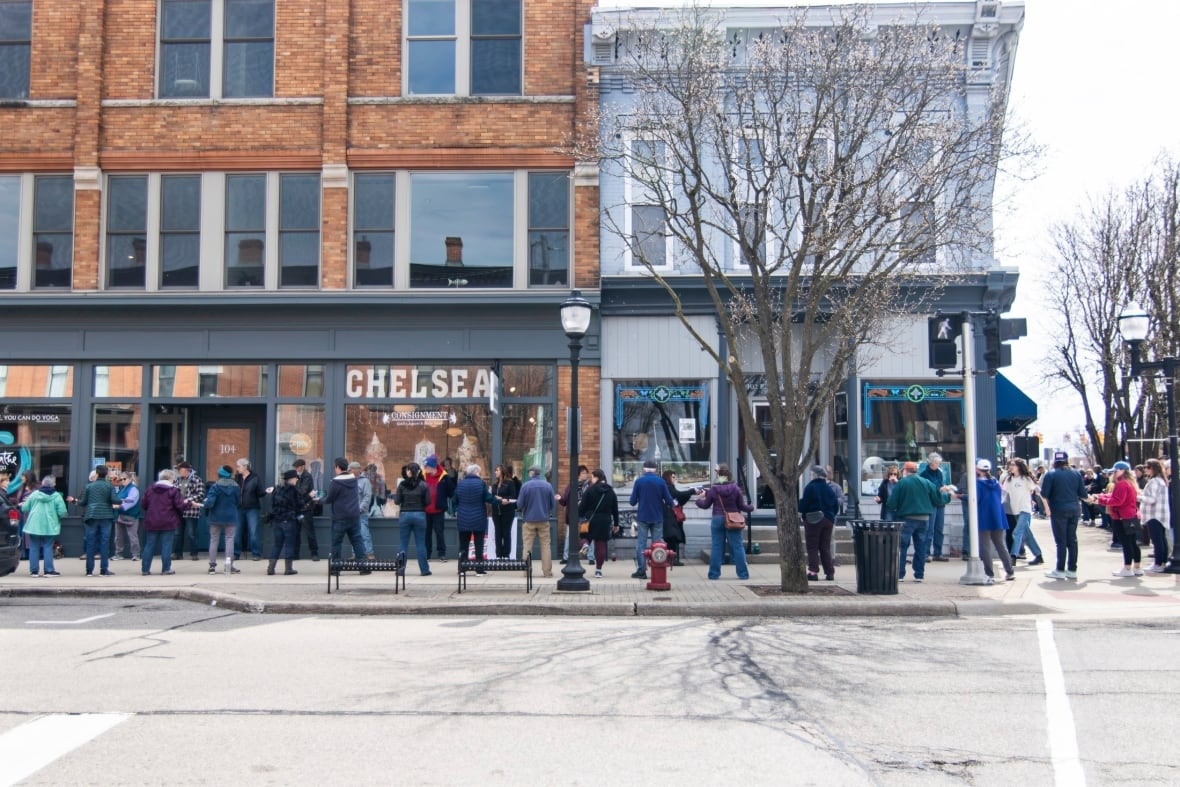 Why a Michigan community formed a human chain to move 9,100 books, one at a time