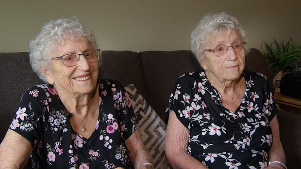 98-year-old Manitoba twins happy to still be teasing, living next door to each other