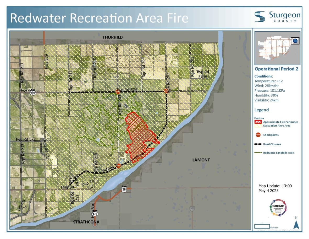 Alberta wildfires force evacuations, burn 1 home northeast of Edmonton