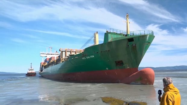Cargo ship towed away from Norway home it nearly struck