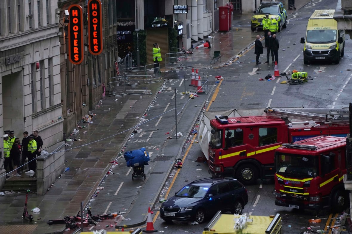 Dozens injured after minivan plows into crowd of celebrating Liverpool soccer fans
