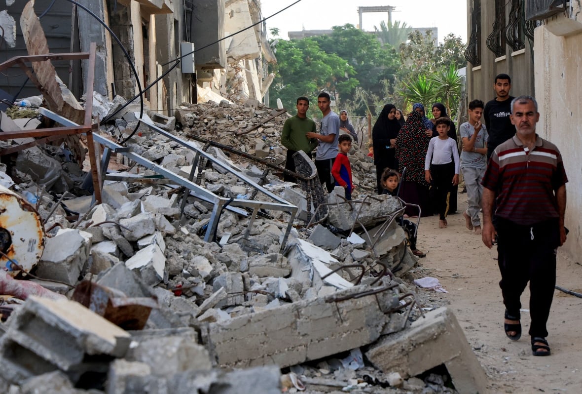 Israel to 'control all parts' of Gaza, Netanyahu says as aid trucks wait to enter territory