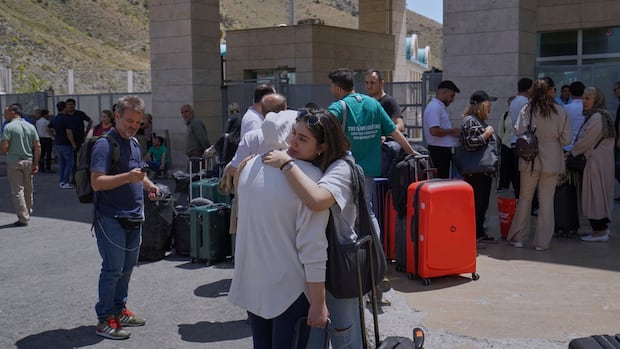 Hundreds of Canadians have fled Middle East but thousands more remain: officials