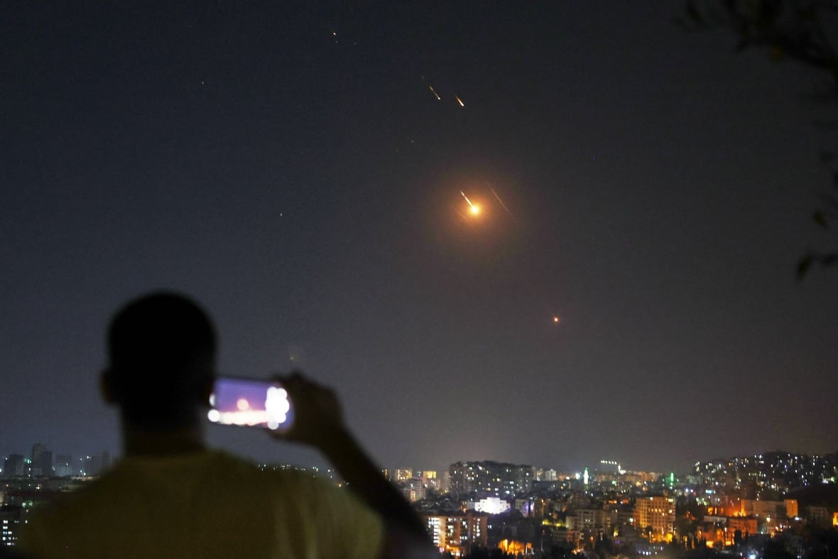 Israeli strikes hit Tehran as Iran warns U.S. involvement would risk 'all-out war'