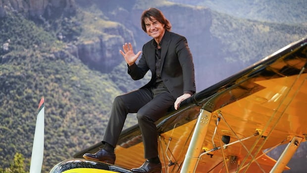 Tom Cruise scores Guinness World Record for most burning parachute jumps