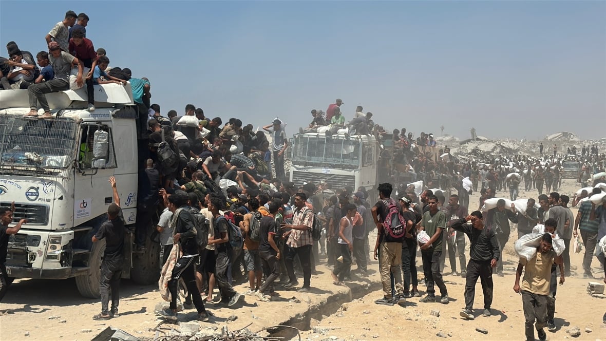 Israel begins limited pause in fighting as criticism mounts over hunger in Gaza