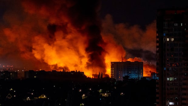 Ukraine says it struck an airbase in Russia amid Moscow's stepped-up drone barrage on Kyiv