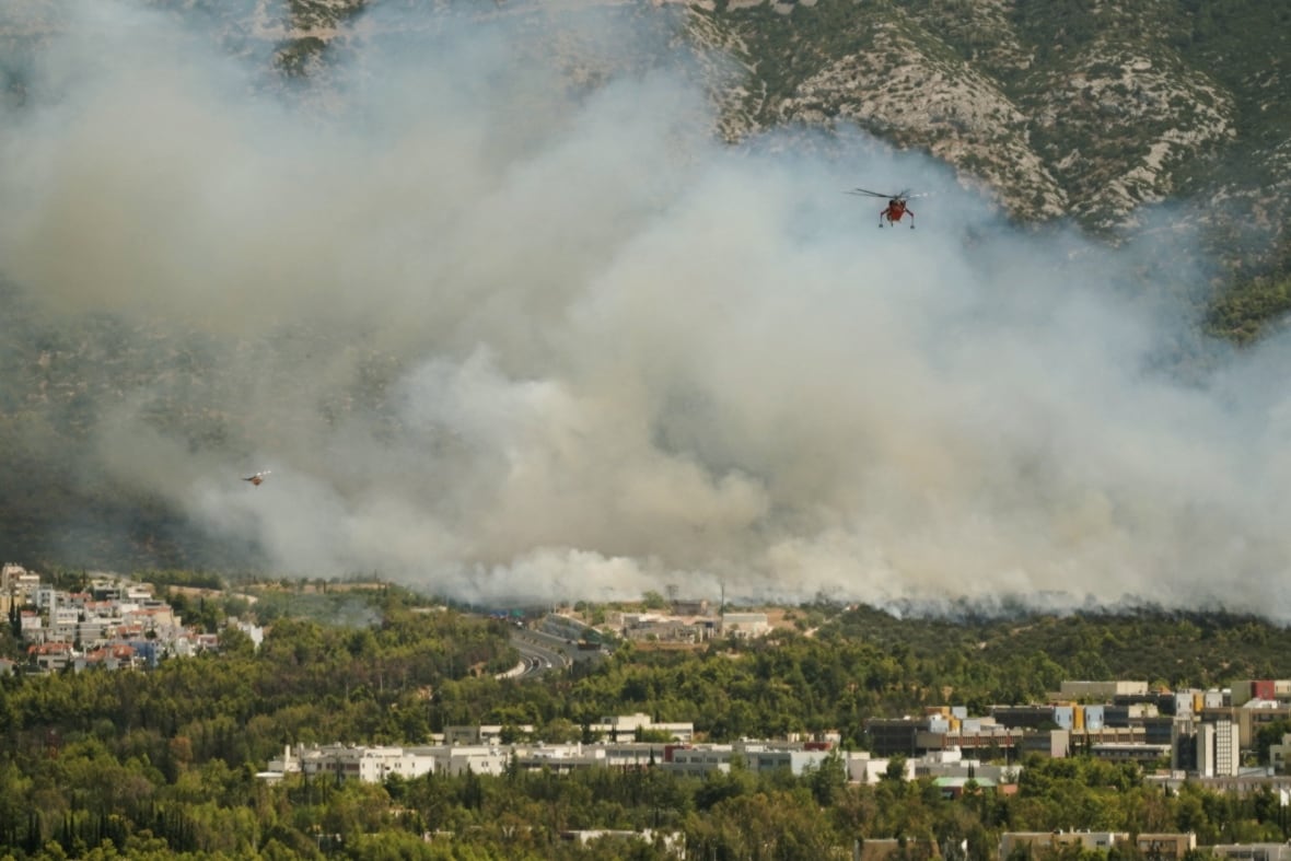 Wildfires scorch large swaths of southeast Europe and the Balkans