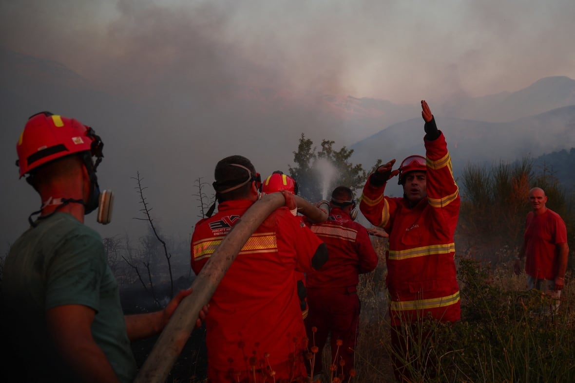 Fires rage in several European countries as sweltering heat continues