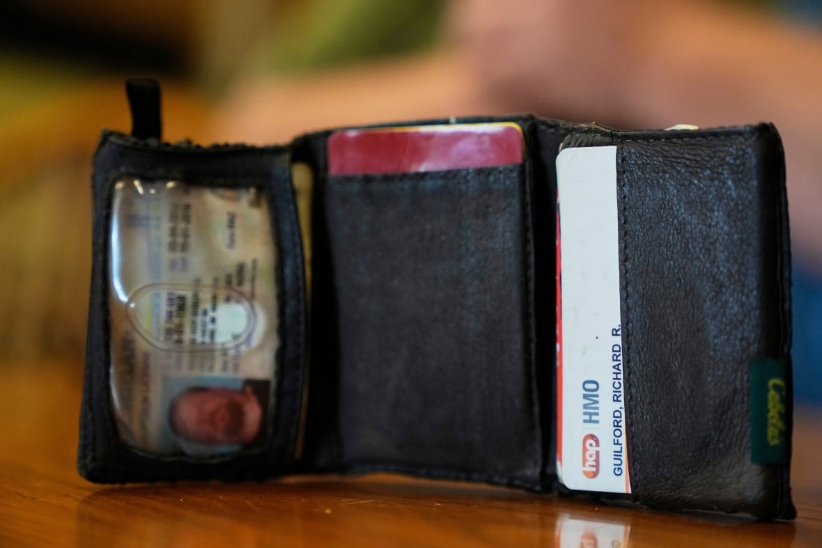 Michigan autoworker's wallet found under hood in Minnesota â 243,000 km later