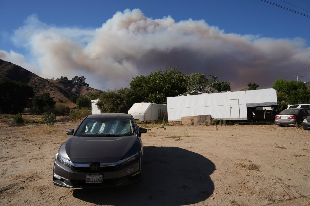 Thousands under evacuation order as wildfire spreads north of L.A.