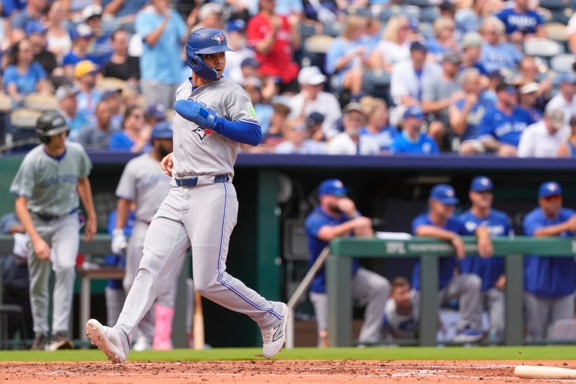 Blue Jays secure playoff spot with 8-5 win against Royals
