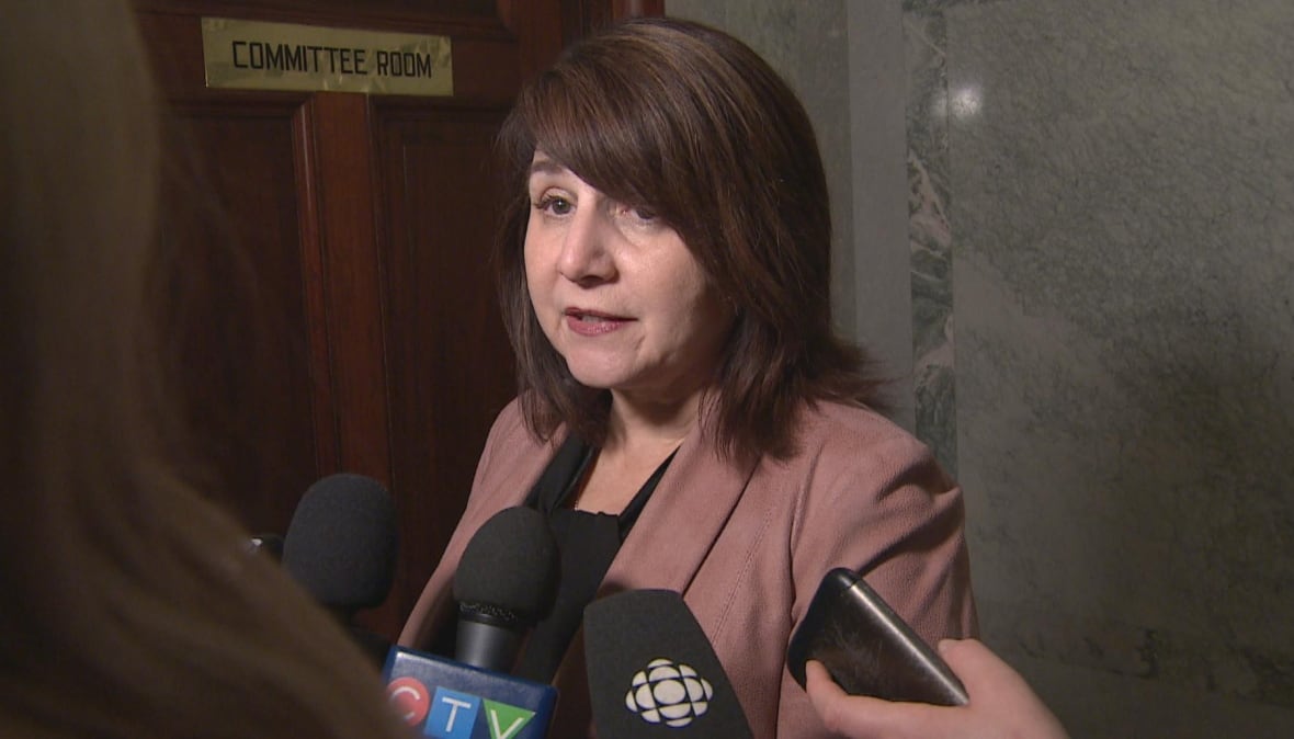 Minister defends Alberta's plan to charge some people for COVID-19 vaccines