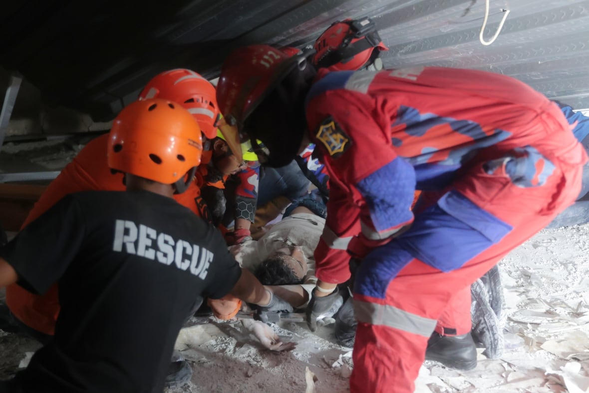 Nearly 100 children hurt, several feared dead and dozens trapped after Indonesian school collapses