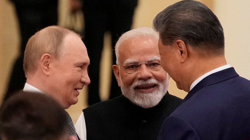 Putin, Modi and Xi meet at China summit