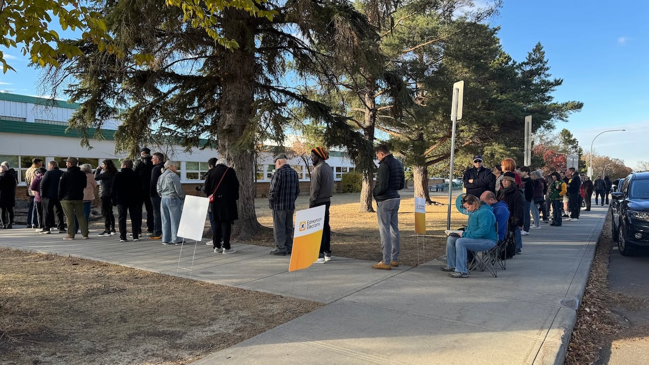 Polls close in Alberta as many polling stations report long wait times