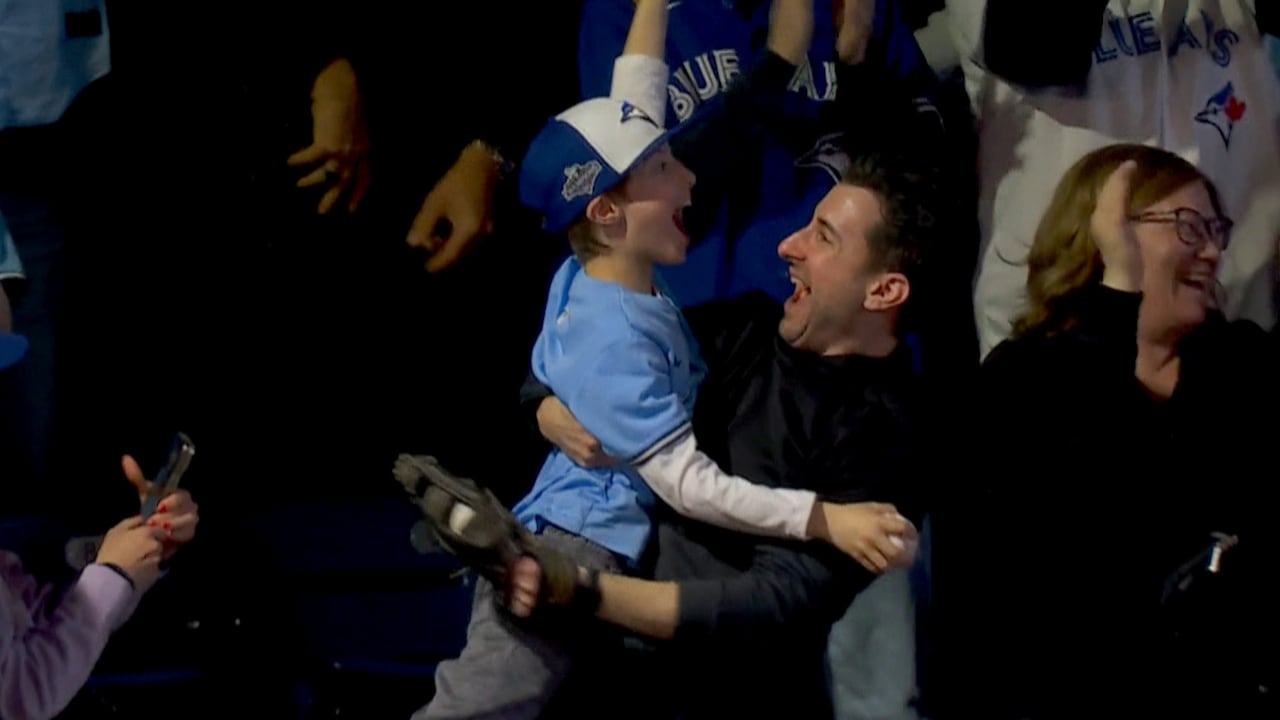 #TheMoment a father and son caught the Jays' 1st home run ball of the season