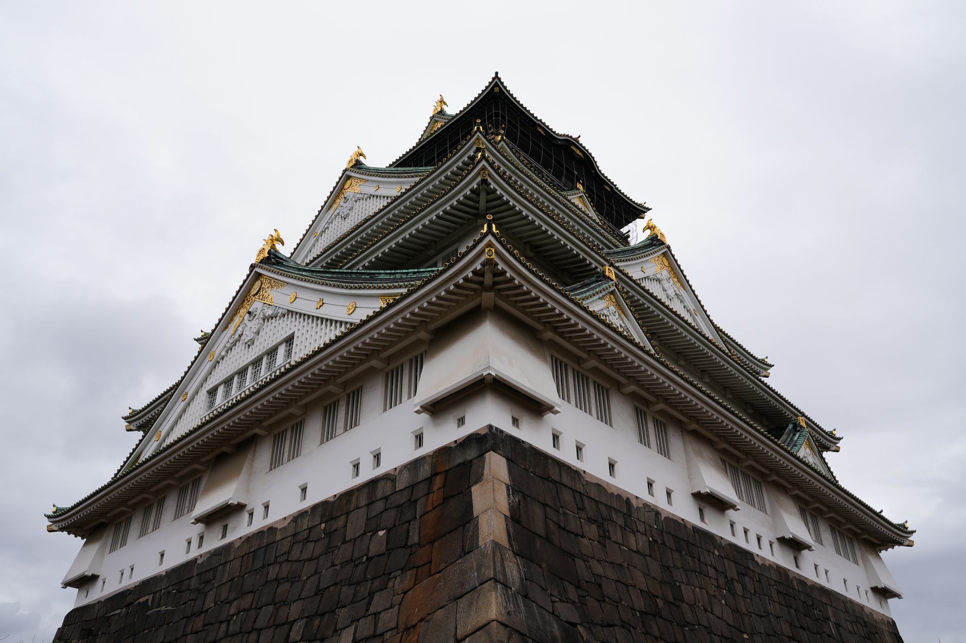 Stunning view of Osaka Castle showcasing its traditional Japanese pagoda-style architecture.